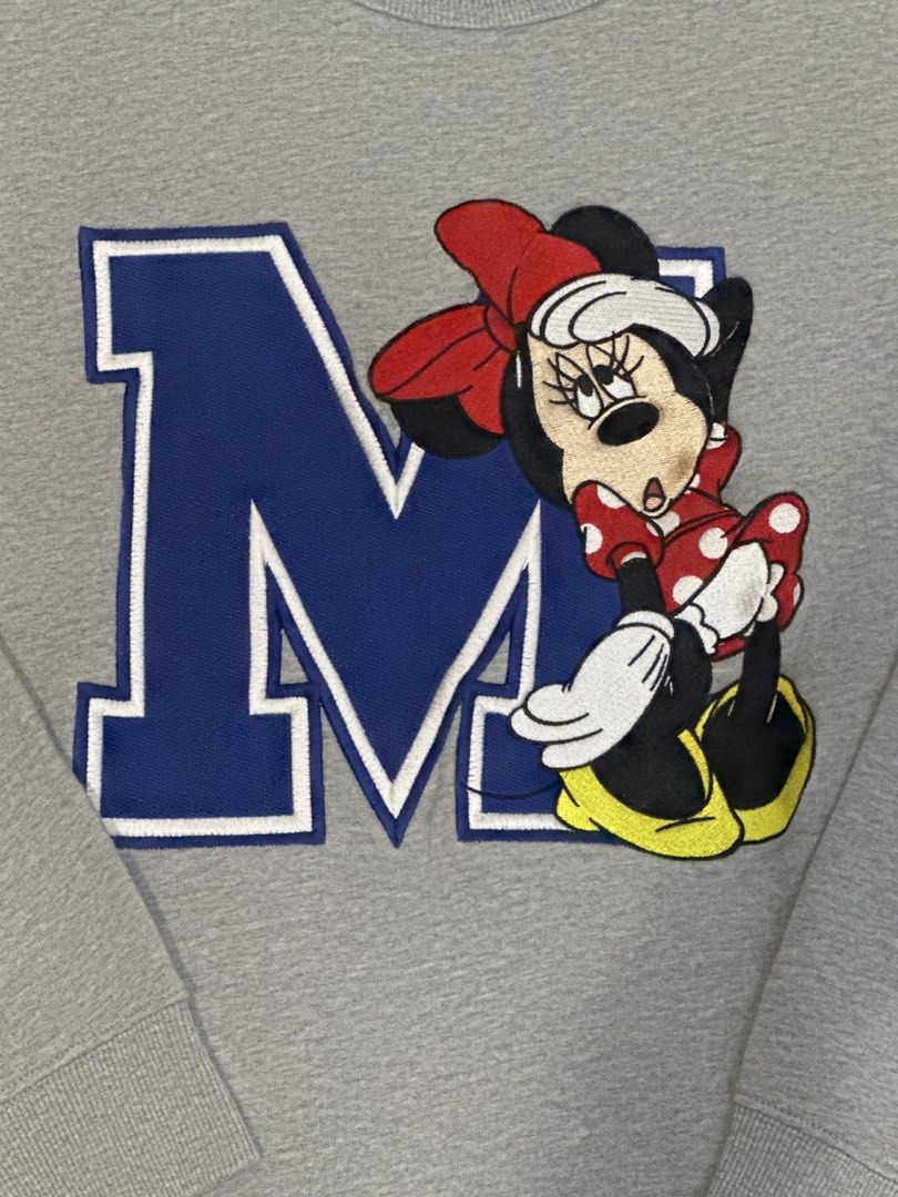 Disney Minnie Mouse "M" Grey Sweatshirt Size S (Category: Coats, Jackets and Outerwear) located in Rizal. Submitted by rann1121 (Listing ID 1459587984, Image 2). Description: - Grey sweatshirt - Features a large "M" and Minnie Mouse graphic - Disney collaboration with White Chocolat - Size: Small - Style: Casual, basic.