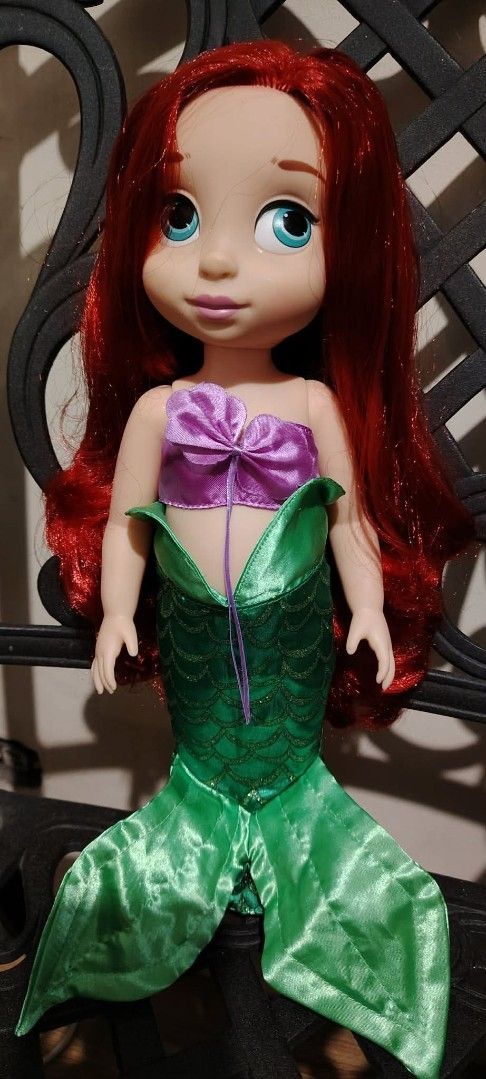 Disney Princess Ariel Toddler Doll (Category: Kids Toys) located in Manila. Submitted by justybelieve2026 (Listing ID 1459629271, Image 2). Description: - Ariel toddler doll - Red hair and blue eyes - Iconic green mermaid tail - Purple seashell top - Perfect for Disney fans - Ideal for imaginative play.