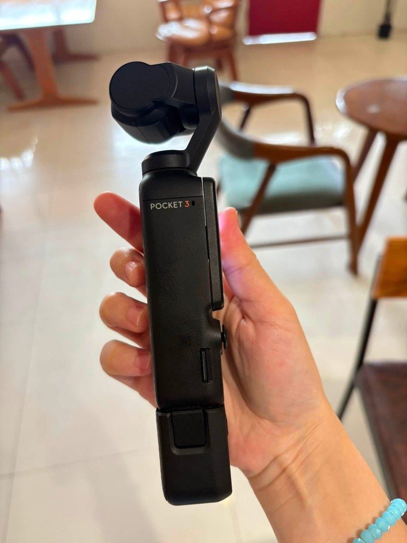 DJI Osmo Pocket 3 Creator Combo (Category: Cameras) located in Masbate. Submitted by panini07 (Listing ID 1459561607, Image 3). Description: - DJI Osmo Pocket 3 Creator Combo - Includes camera, protective case, mini microphone, tripod grip, and mounting bracket - Screen protector already applied - All items in original box Rfs: upgrade.