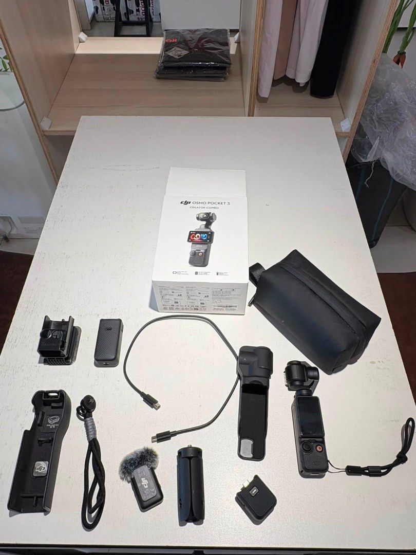 DJI Osmo Pocket 3 Creator Combo (Category: Cameras) located in Masbate. Submitted by panini07 (Listing ID 1459561607, Image 1). Description: - DJI Osmo Pocket 3 Creator Combo - Includes camera, protective case, mini microphone, tripod grip, and mounting bracket - Screen protector already applied - All items in original box Rfs: upgrade.