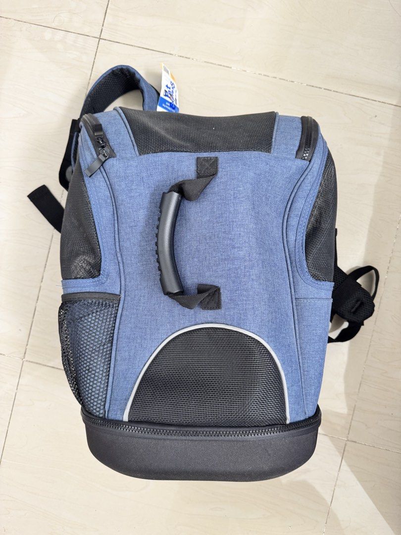 Dog Backpack Carrier (Category: Homes & Other Pet Accessories) located in Manila. Submitted by happyfinds.024 (Listing ID 1459493162, Image 2). Description: Petpals 2-in-1 deluxe pet backpack bought at Pet Express for 1999. Bought last May 2025 para sana nung pumunta kami sa Elyu but was never used dahil hindi sanay dogs ko. Medyo maalikabok lang dahil natambak. RFS: Need additional funds for Hope's (my dog) lab tests and meds since she was diagn