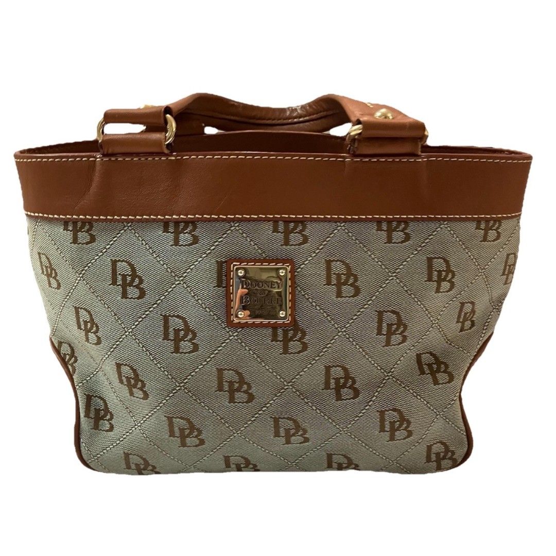 Dooney & Bourke Mini East/West Monogram Handle Tote (Category: Tote Bags) located in Digos. Submitted by richcaliforniaclothingstore (Listing ID 1459560546, Image 1). Description: Manage your exepctation this is not bnew. ♡Authentic/preloved item. Actual photos posted. Please check all photos and details carefully before purchasing. Minor signs of use may be present. Walk in buyers are always welcome!✨️ 📍Location: Lim extension,Digos City Davao 