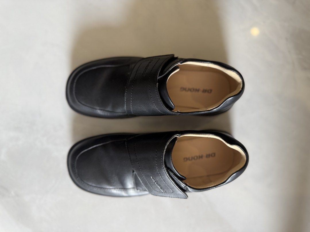 Dr. Kong Black Leather Velcro Shoes (Category: Kids Wardrobes & Storage) located in Santa Rosa. Submitted by elainne_evrbloom (Listing ID 1459523366, Image 1). Description: - Brand: Dr. Kong - Material: Black Leather - Closure: Velcro straps for easy adjustment - Comfort: Comfortable and practical for everyday wear - Use: Good for walking or casual outings - Condition: Please check photos for details.