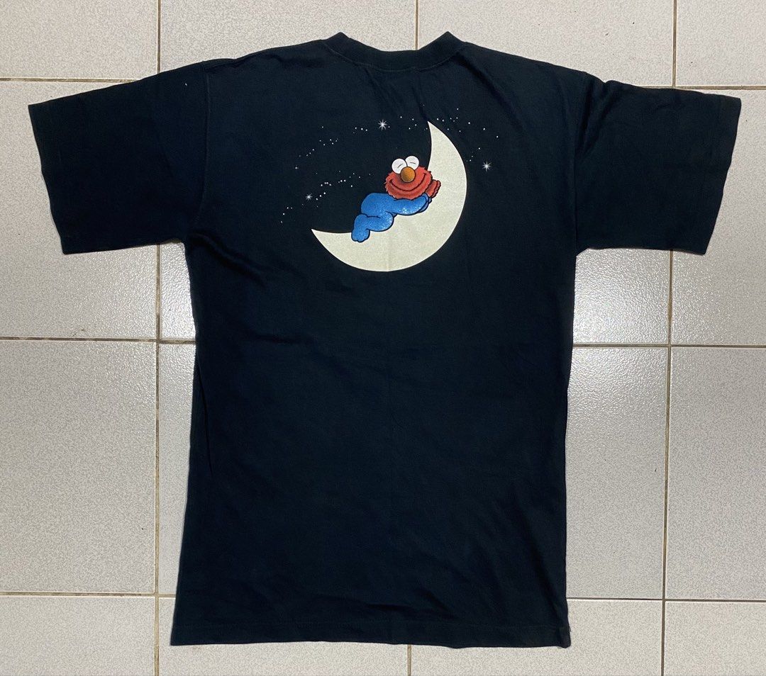 Elmo Tshirt Michael Tag (Category: Tshirts & Polo Shirts ) located in Mandaue City. Submitted by MJ_80 (Listing ID 1459631895, Image 2). Description: 1998 Elmo Vintage Tshirt Glow in the dark print on halfmonm Medium Dimes: 18.5 X 27.5 See photos for measurements Color rate & Condition: 9.9/10 Price: 1,350 .