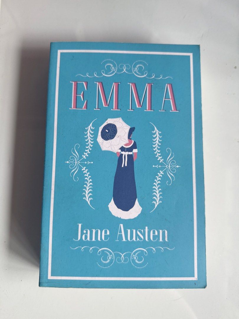 Emma by Jane Austen Classic Novel (Category: Storybooks) located in San Juan City. Submitted by jcsay_ (Listing ID 1459554346, Image 1). Description: - Classic novel: Emma by Jane Austen - Beautiful teal cover with vintage illustration of a woman with an umbrella - Perfect for fans of classic literature - Adds a touch of vintage charm to any bookshelf.