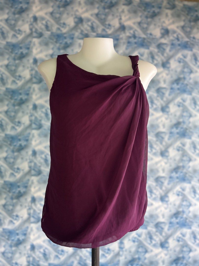 Express Purple Draped One-Shoulder Top (Category: Blouses) located in Lal-Lo. Submitted by pureearth_8c747c (Listing ID 1459545661, Image 1). Description: - Express purple top - Draped design with knot detail on shoulder - Lightweight fabric - Easy to dress up or down - Versatile for various occasions.