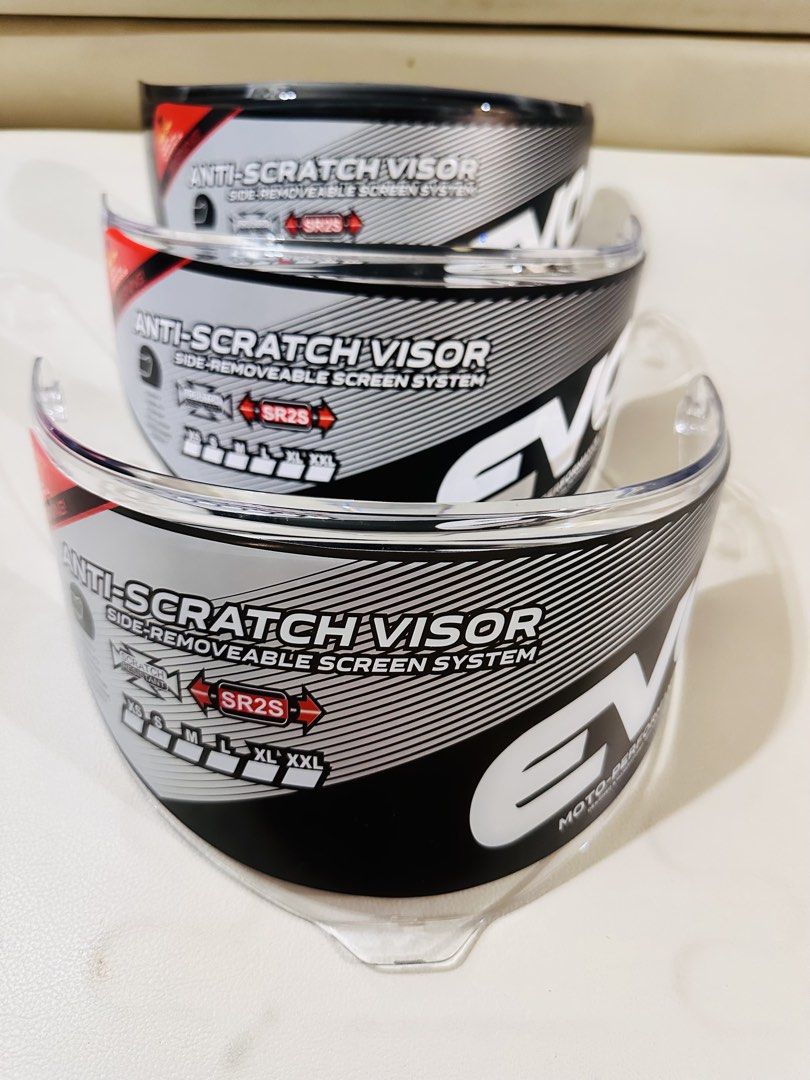 For take all EVO Anti-Scratch Helmet Visor (Category: Helmets and other Riding Gears) located in Manila. Submitted by oja02 (Listing ID 1459626416, Image 2). Description: EVO anti-scratch visors 2 clear 1 tinted black Brand new. Sticker still attached. Loc: Manila.