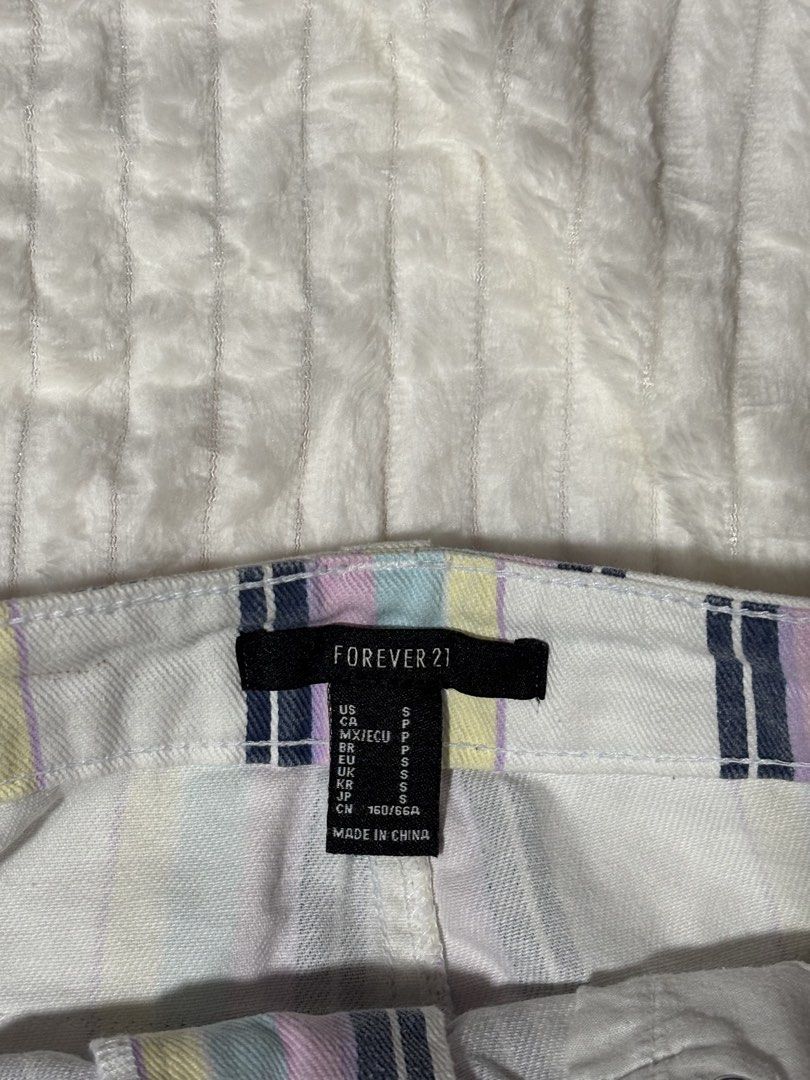 Forever 21 Striped Denim Mini Skirt (Category: Skirts) located in Quezon City. Submitted by xoxoari (Listing ID 1459604935, Image 3). Description: - Cute pastel striped denim mini skirt - Brand: Forever 21 - Button and zip closure - Size S-M Discount if getting 2 or more items! .