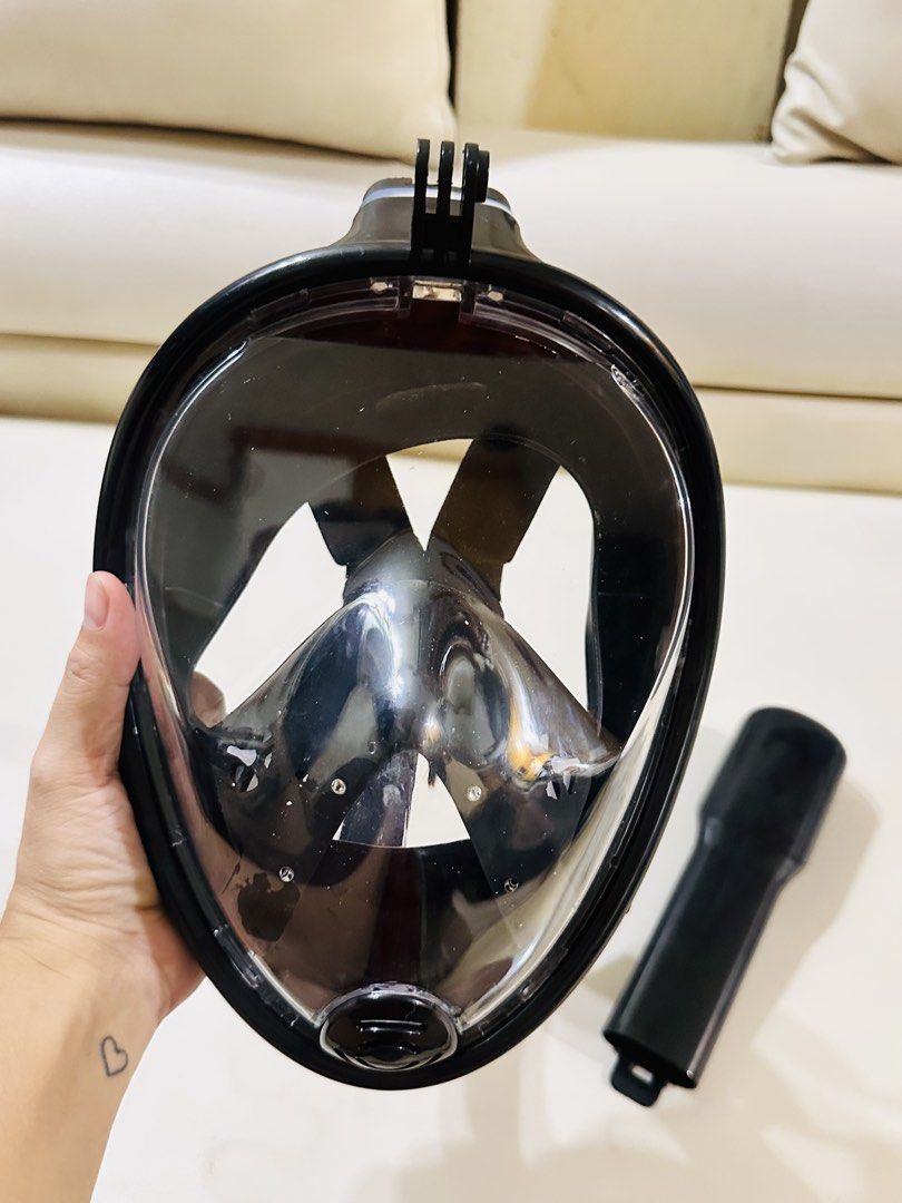 Full Face Snorkel Mask with GoPro Mount (Category: Water Sports) located in Manila. Submitted by oja02 (Listing ID 1459624893, Image 2). Description: Black full face snorkel mask for comfortable underwater exploration. Breathe naturally through your nose or mouth. Built-in mount for your GoPro or action camera. Detachable breathing tube for convenience. Comes with a mesh storage bag. Used once only. Loc: Manila.