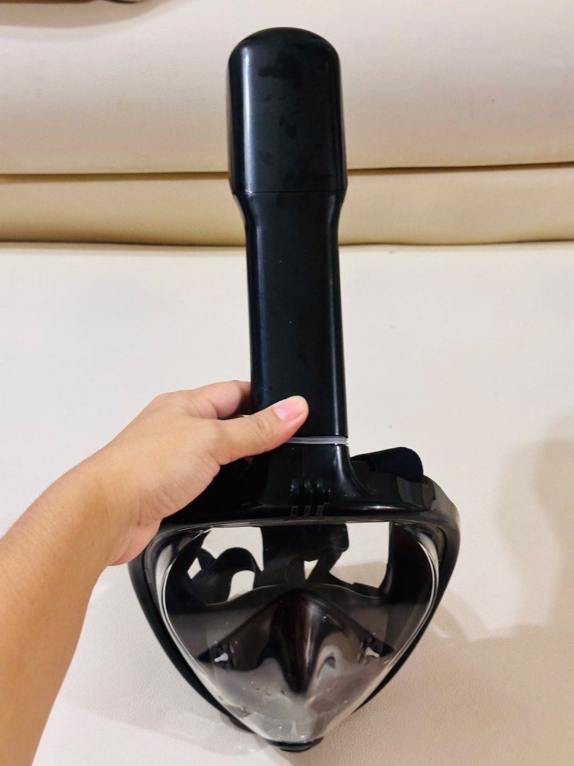 Full Face Snorkel Mask with GoPro Mount (Category: Water Sports) located in Manila. Submitted by oja02 (Listing ID 1459624893, Image 3). Description: Black full face snorkel mask for comfortable underwater exploration. Breathe naturally through your nose or mouth. Built-in mount for your GoPro or action camera. Detachable breathing tube for convenience. Comes with a mesh storage bag. Used once only. Loc: Manila.