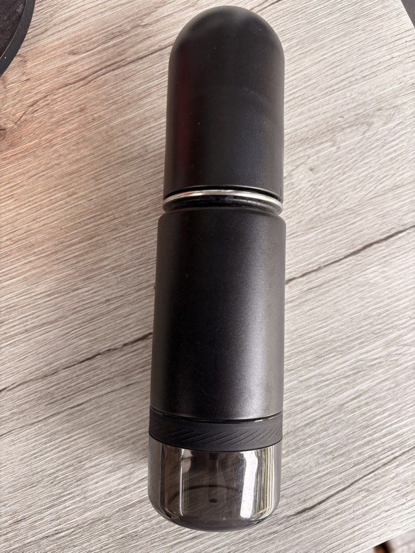 FURMOS Portable Pet Water Bottle (Category: Health & Grooming) located in Santa Rosa. Submitted by bluemingbh (Listing ID 1459584172, Image 2). Description: - Portable water bottle with built-in dispenser - Ideal for walks and travel - Easy to use: just fill and go - Keeps your pet hydrated on the go - Black color.