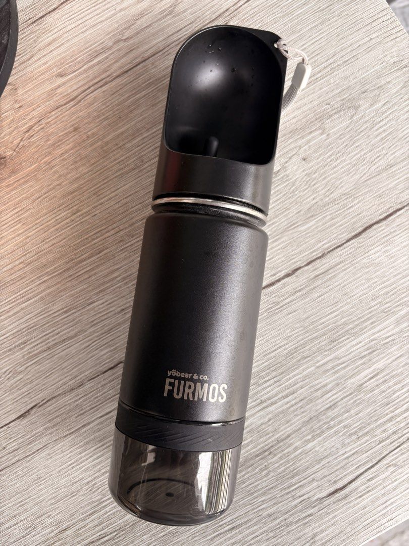 FURMOS Portable Pet Water Bottle (Category: Health & Grooming) located in Santa Rosa. Submitted by bluemingbh (Listing ID 1459584172, Image 1). Description: - Portable water bottle with built-in dispenser - Ideal for walks and travel - Easy to use: just fill and go - Keeps your pet hydrated on the go - Black color.
