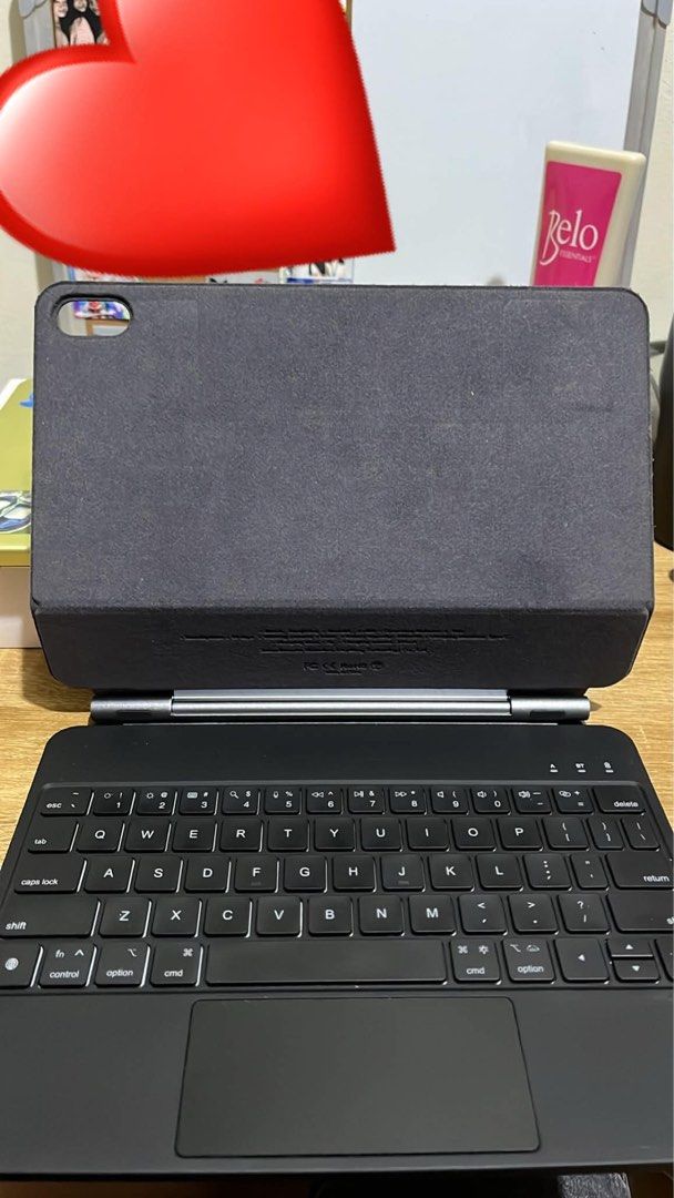Goojodoq Magic Keyboard for Ipad (Category: Cases & Sleeves) located in Manila. Submitted by graceeeeee_ (Listing ID 1459608852, Image 1). Description: -with minimal sticker stains - Connects wirelessly via Bluetooth - Provides protection for your iPad - Minor scuffs visible on the back cover - Keyboard is clean and fully functional - Ideal for convenient typing on the go.