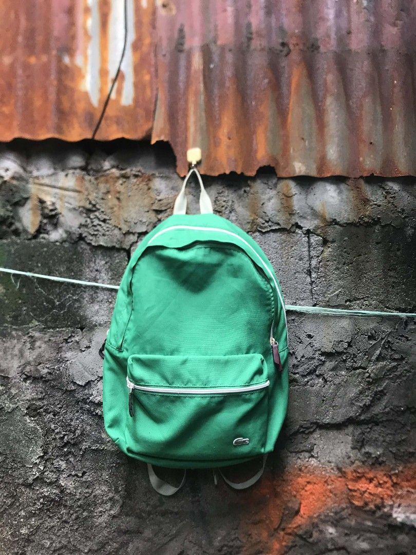 Green Lacoste Backpack (Category: Backpacks) located in Quezon City. Submitted by carlodepaz (Listing ID 1459606222, Image 1). Description: - Green Lacoste backpack - Front zip pocket - Iconic crocodile logo - Adjustable straps for comfort - Spacious interior for essentials - Smooth zippers - Durable material - Ideal for everyday use or travel.