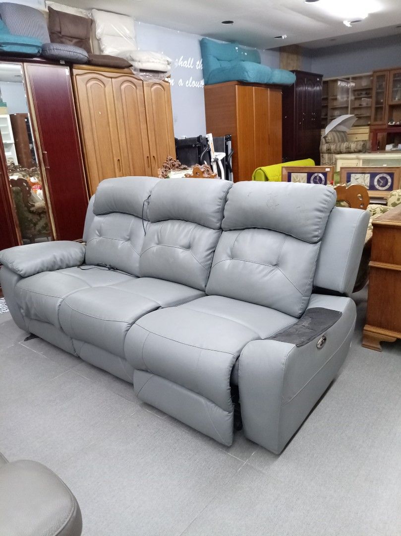 Grey Leather Recliner Sofa (Category: Sofas) located in Manila. Submitted by keenhorse.30d35c (Listing ID 1459586765, Image 1). Description: - Grey leather 3-seater recliner sofa - Comfortable for your living room - Some minor marks on the armrest - Pickup only.