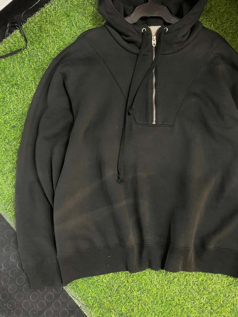 Gucci Black Half Zip Hoodie (Category: Coats, Jackets and Outerwear) located in Cainta. Submitted by mariss.luxx (Listing ID 1459542132, Image 2). Description: - Authentic Black Gucci Hoodie - Half zip design - Iconic Gucci logo on sleeve - Features circular GG motif - Ribbed cuffs and hem for a snug fit - Adjustable drawstring hood - A great addition to any Gucci collection.