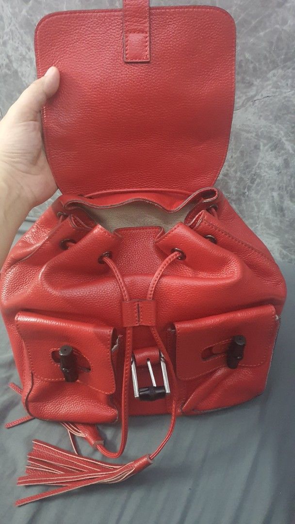 Gucci Flap Bamboo BackPack (Category: Backpacks) located in Manila. Submitted by togodbethegloryteamjesus (Listing ID 1459529862, Image 3). Description: - Red Leather Gucci Backpack - Signature Bamboo Accents on Front Pockets & Top Handle - Stylish Tassel Details - Secure Buckle Closure on Flap - Adjustable Straps for Comfort - Spacious Interior for Everyday Essentials - Perfect for Daily Use.