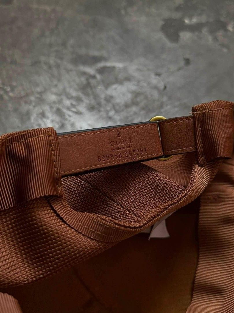 GUCCI GG MONOGRAM (Category: Caps & Hats) located in Pasig City. Submitted by dees_collection (Listing ID 1459625604, Image 3). Description: That is a brown and beige Gucci GG monogram baseball cap featuring a smooth leather visor and mesh detailing. MESSAGE FOR INTERESTED..