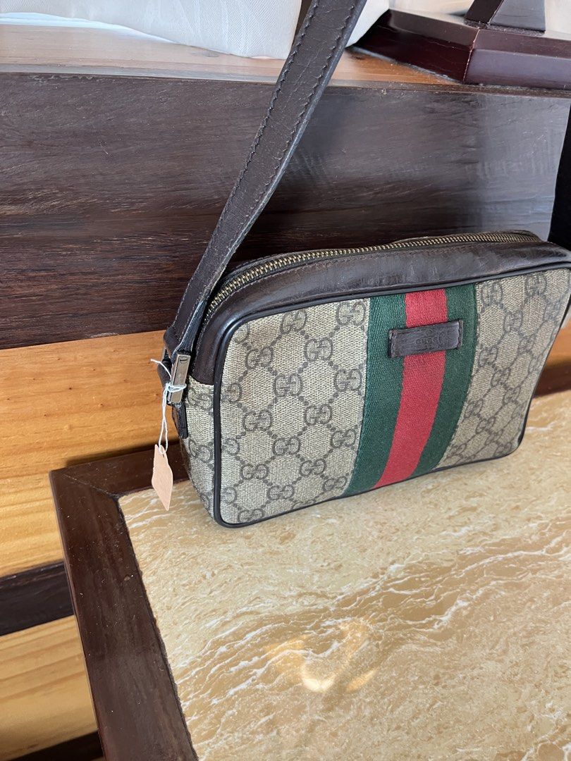 Gucci Monogram Canvas Crossbody Bag authenti (Category: Luxury Bags & Wallets) located in Tacloban City. Submitted by luxbag_phhh (Listing ID 1459569668, Image 2). Description: - Authentic Gucci crossbody bag - Classic GG monogram canvas - Signature green and red stripe detail - Genuine leather trim and strap - Secure zipper closure - Interior leather tag with serial number: 181091 203998 - Ideal for everyday use Authentic.