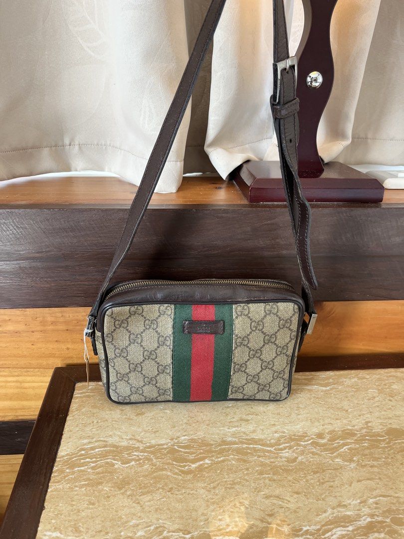 Gucci Monogram Canvas Crossbody Bag authenti (Category: Luxury Bags & Wallets) located in Tacloban City. Submitted by luxbag_phhh (Listing ID 1459569668, Image 1). Description: - Authentic Gucci crossbody bag - Classic GG monogram canvas - Signature green and red stripe detail - Genuine leather trim and strap - Secure zipper closure - Interior leather tag with serial number: 181091 203998 - Ideal for everyday use Authentic.