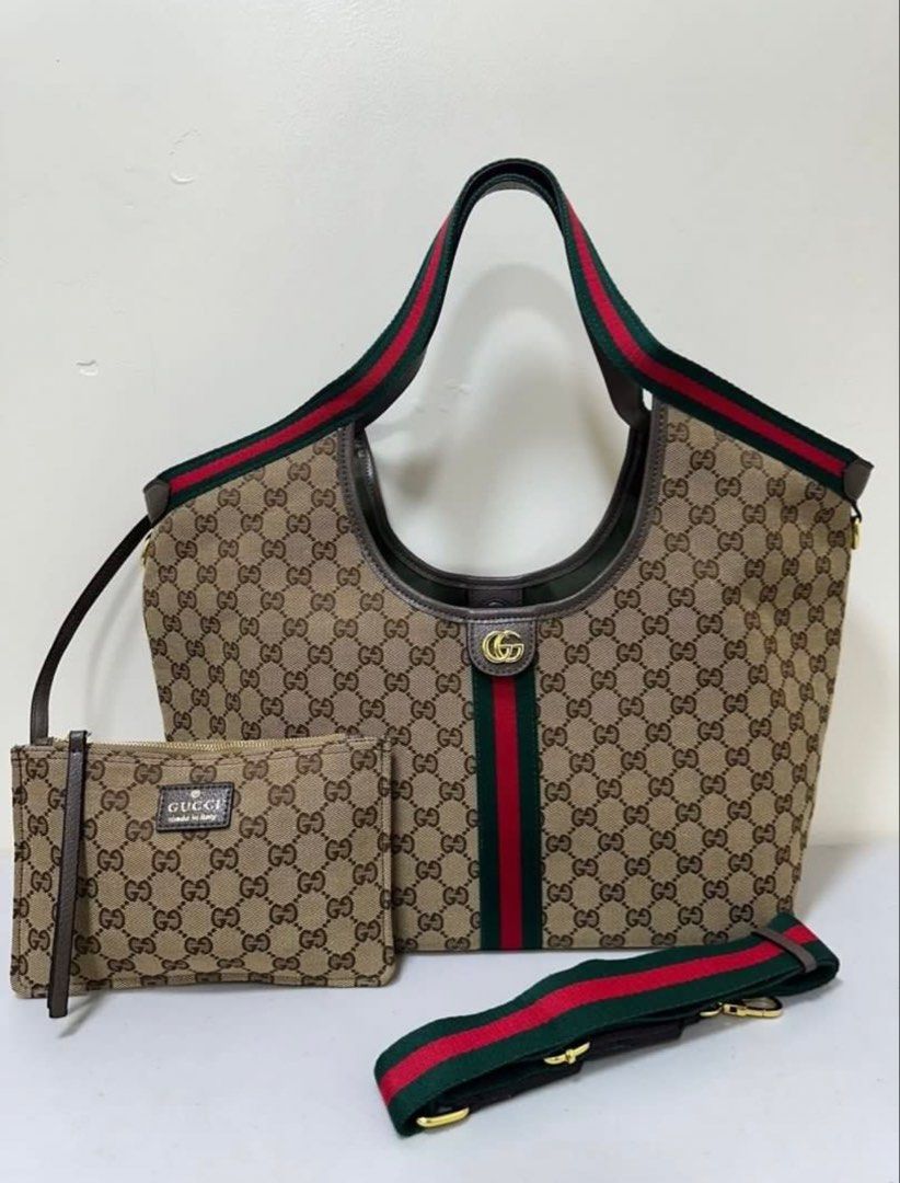 Guccinggg giglio (Category: Luxury Bags & Wallets) located in Los Banos. Submitted by ditasbautista2329 (Listing ID 1459686638, Image 2). Description: Gucccingg giglio Canvass Comes with pouch Actual picture posted Super ganda nitong bag na ito pang office or pang travel pwedeng pwede.