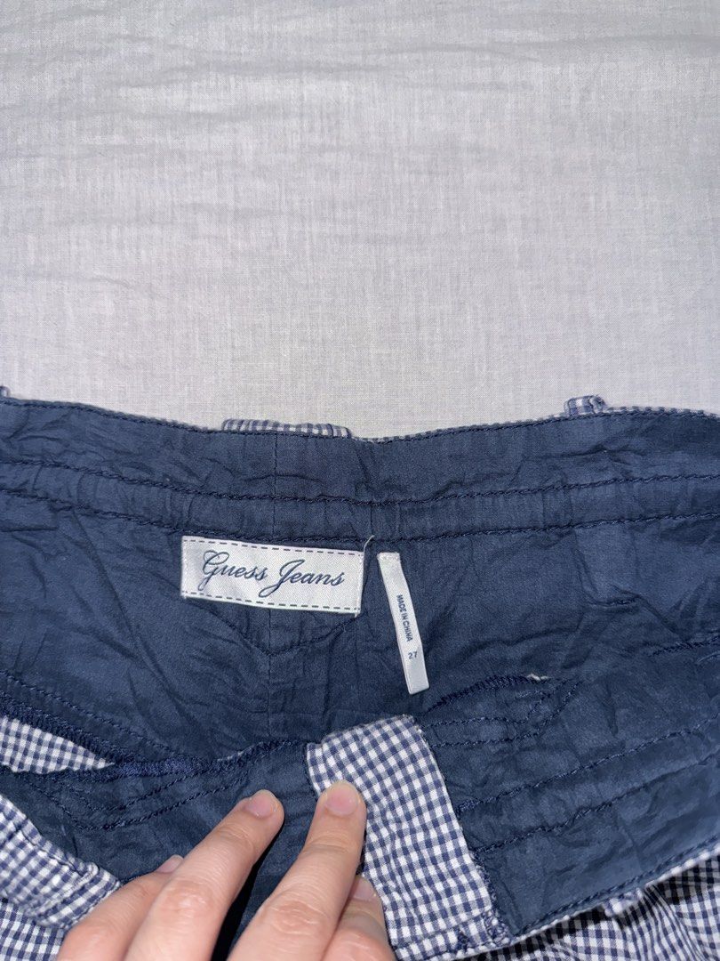 Guess Jeans Gingham Shorts (Category: Shorts) located in Santa Ana. Submitted by fatikilla (Listing ID 1459540973, Image 2). Description: - Brand: Guess Jeans - Style: Gingham shorts - Color: Navy and white checkered - Features: Tie waist detail - Size: 27 - Occasion: Casual wear - Condition: Comfortable and stylish.