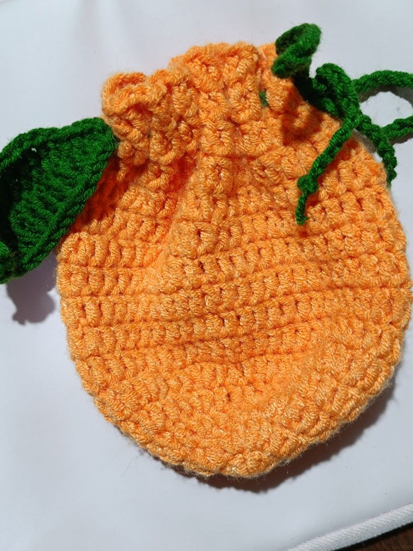 Handmade Orange Crochet Drawstring Pouch Bag Cute Aesthetic (Category: Purses & Pouches) located in Manila. Submitted by theorangewolf (Listing ID 1459613332, Image 2). Description: - Handmade crochet pouch in a cute orange color. - Perfect for storing small items like coins, jewelry, or trinkets. - Also makes a unique and lovely gift bag. - Can customize - payment first - mod: j&t, lalamove, grab exp - mop: gcash, maribank.