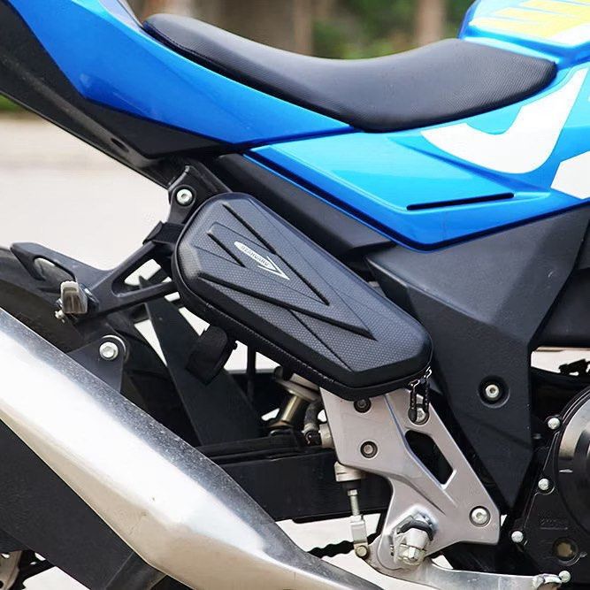 Hard Shell Motorcycle Saddle Bag Waterproof Frame Bag (Category: Shoulder Bags) located in Manila. Submitted by starbalesukandjapansurplus (Listing ID 1459522047, Image 2). Description: - Waterproof hard shell saddle bag - Fits motorcycles and electric vehicles - Attaches securely to the frame - Ample storage space inside - Features internal mesh pockets for organization - Zipper closure for secure storage - Ideal for tools, phones, and ride esse