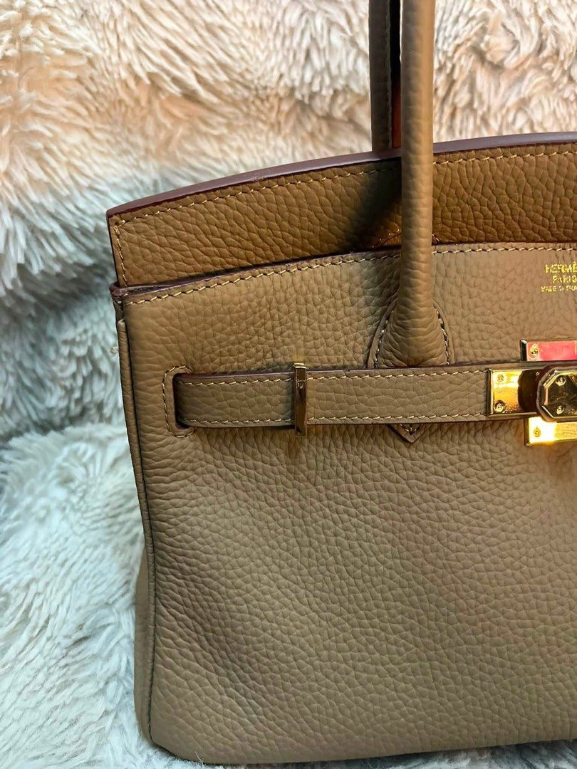 Hermes Birkin Taupe Leather Gold Hardware (Category: Luxury Bags & Wallets) located in San Pedro. Submitted by kianacrngn (Listing ID 1459658257, Image 3). Description: - Authentic Hermes Birkin Bag - Color: Taupe - Material: Pebbled Leather - Hardware: Gold - Origin: Made in France - Features: Timeless, durable, iconic design - Versatile: Suitable for daily use or special occasions.