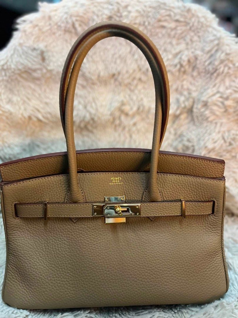Hermes Birkin Taupe Leather Gold Hardware (Category: Luxury Bags & Wallets) located in San Pedro. Submitted by kianacrngn (Listing ID 1459658257, Image 1). Description: - Authentic Hermes Birkin Bag - Color: Taupe - Material: Pebbled Leather - Hardware: Gold - Origin: Made in France - Features: Timeless, durable, iconic design - Versatile: Suitable for daily use or special occasions.
