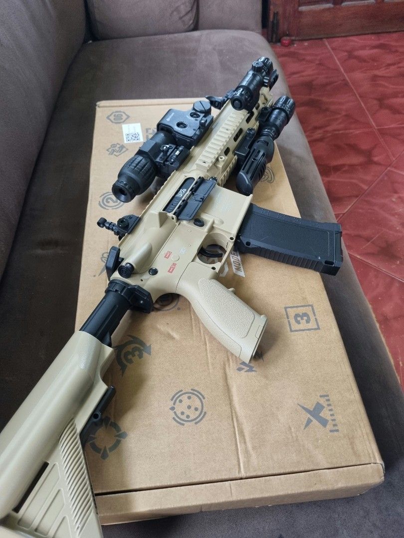 High End HK416v2 Gel Blaster (Category: Action & Battle Toys) located in Santa Rita. Submitted by coolguy29 (Listing ID 1459639211, Image 2). Description: 🔥 Brand new High end HK416 v2, full nylon body at may blowback na, 3-4 hours bago ma lowbat at umaabot na range nito ng 60-90ft kase 230fps-250fps na lakas nito. Sobra dami narin kasama attachments nito at naka prime magazine narin. Perfect pang hobby/sports play oh pang regalo mo sa sarili mo