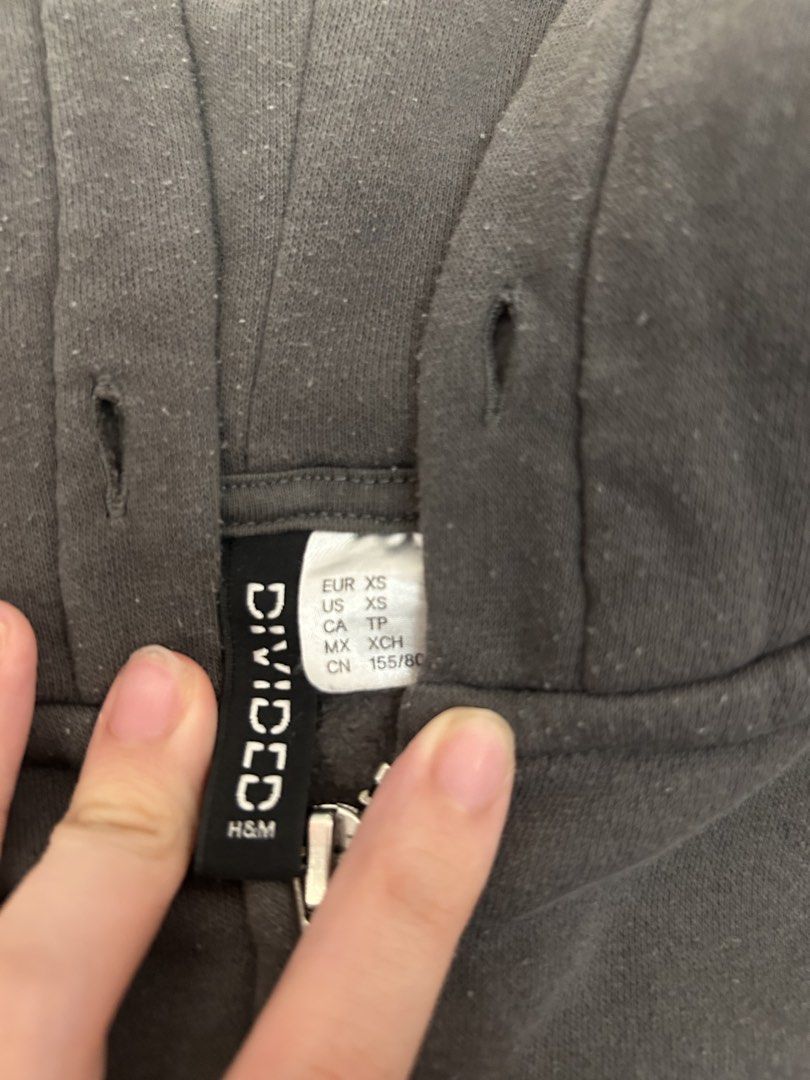 H&M Divided Nirvana Graphic Zip-Up Hoodie (Category: Coats, Jackets and Outerwear) located in Manila. Submitted by coquettecosette (Listing ID 1459555658, Image 2). Description: 🩶 H&M Divided Nirvana Zip-Up Hoodie 🎀 Cute grey zip-up hoodie featuring the iconic Nirvana smiley face graphic on the front ♡ Size XS. Perfect for casual outfits, layering, or adding a cute grunge touch to your look ✧ In good condition with lots of life left! Please che