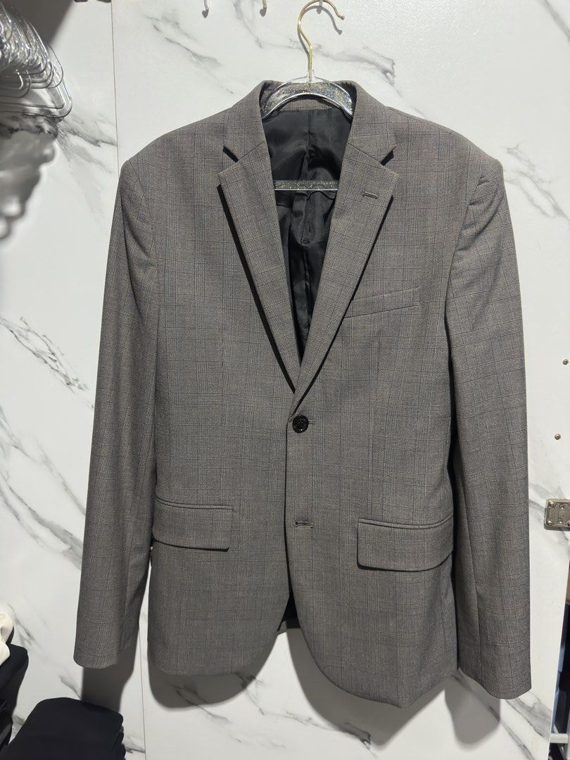 H&M Slim Fit Grey Plaid Blazer (Category: Coats, Jackets and Outerwear) located in Baguio. Submitted by miss_misery (Listing ID 1459654444, Image 1). Description: - H&M Slim Fit Grey Blazer - Subtle Plaid Pattern - Single Button Closure - Two Front Flap Pockets - Fully Lined Interior - Ideal for Smart Casual or Formal Occasions.