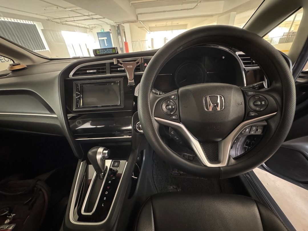 Honda Shuttle 1.5 G Honda Sensing (A) (Category: Used Cars) located in Singapore. Submitted by ethan.hoo (Listing ID 1459623679, Image 3). Description: Honda Shuttle 1.5G Sensing | 1st Owner |Direct Owner | 128k KM | COE Jan 2030 Selling my well-maintained Grey Honda Shuttle 1.5G CVT Sensing, registered in January 2020. 🚗 Key Details • 2020 Honda Shuttle 1.5G CVT Sensing, Keyless • 1st owner — privately owned since new • 130,000 km mileage • 1.5