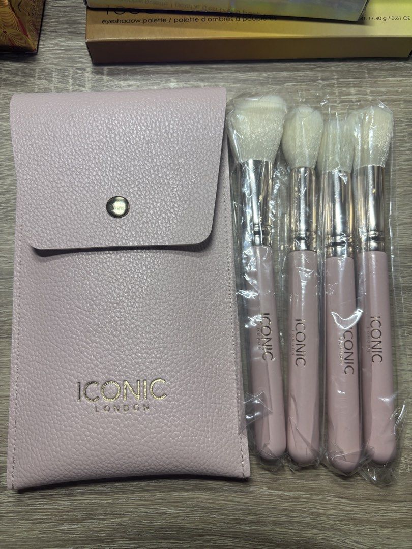 ICONIC LONDON Makeup Brush Set with Pouch (Category: Makeup) located in Davao. Submitted by mielle_888 (Listing ID 1459598662, Image 3). Description: - ICONIC LONDON makeup brush set - Comes with a stylish pink faux leather pouch - Includes 4 individually wrapped makeup brushes - Brushes feature chic pink handles with elegant gold accents - Pouch has a secure gold snap closure - Ideal for both travel and everyday makeup application.