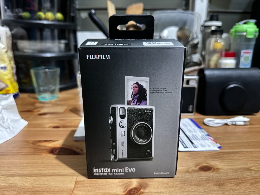 INSTAX MINI EVO BLACK (Category: Cameras) located in Manila. Submitted by pijaypj (Listing ID 1459546145, Image 3). Description: INSTAX MINI EVO BLACK Hindi masyadong nagamit Inclusions: ✅ leather case with strap ✅ plastic case ✅ 32GB memory card ✅ box ✅ manual ✅ charging cable can do meet up or shipping.