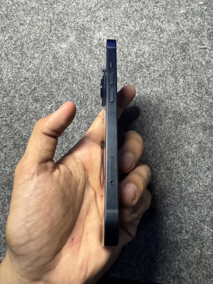 iPhone 14 Midnight (Category: iPhone 14 Series) located in Angeles City. Submitted by petins0203 (Listing ID 1459534492, Image 3). Description: iPhone 14 Midnight "PRISTINE CONDITION” ✨ • 128GB • Factory Unlocked (FU), any SIM • 98% Battery Health 🔋 • 90 Charge Times • 3 months old only • Warranty until April 27, 2027 • NTC Approved 🇵🇭 • True Tone ✅ • Face ID ✅ • Unlimited Reset • No history of repair • No issue, 100% working • Slight dents on