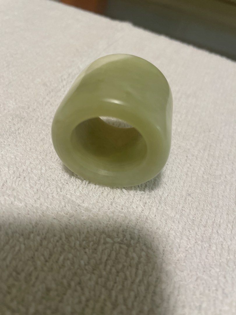 Jade Ring (Category: Accessory holder, box & organizers) located in Singapore. Submitted by kingsmen65 (Listing ID 1459529004, Image 2). Description: - Classic jade ring - Light green color - Features natural inclusions - Smooth finish.