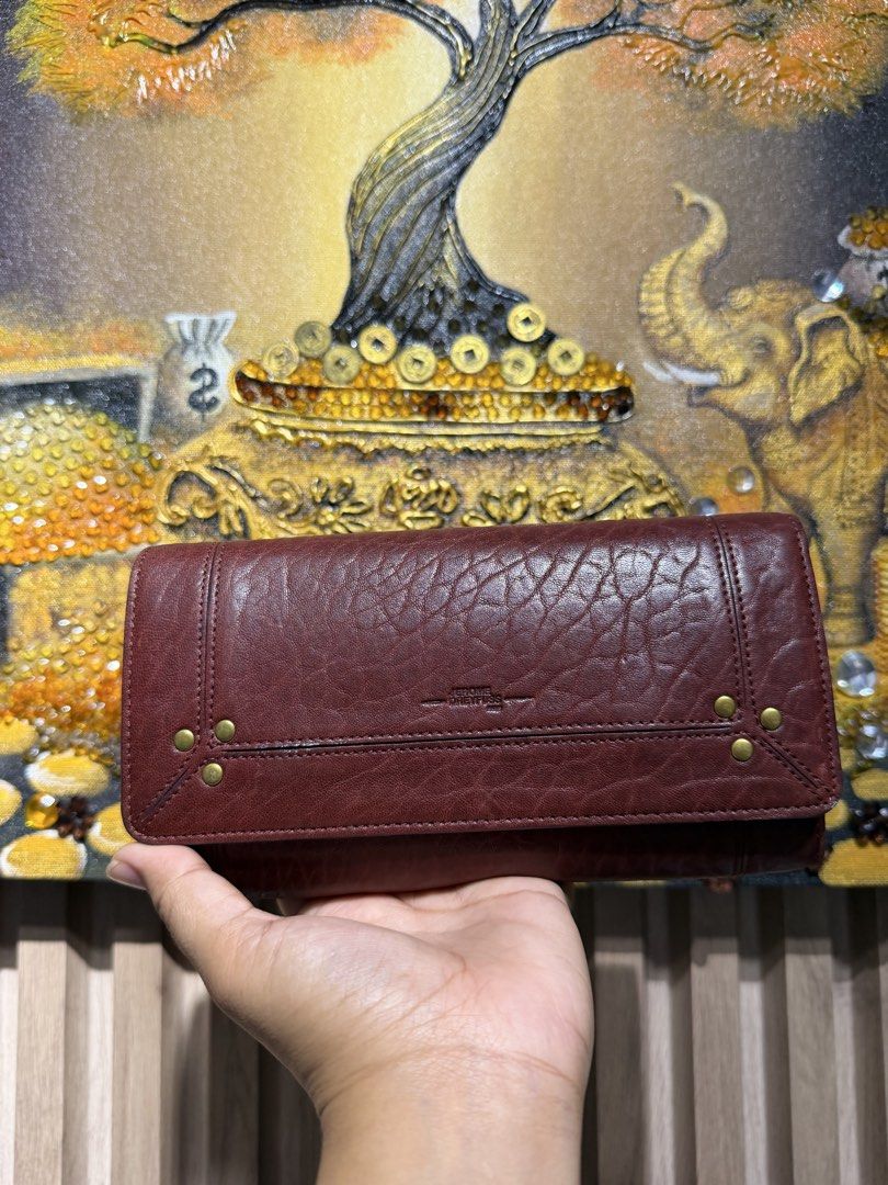 Jerome Dreyfuss Paris Brown Leather Wallet with Chain Strap (Category: Luxury Bags & Wallets) located in Taguig. Submitted by xylasprelovedbag (Listing ID 1459521274, Image 1). Description: - Genuine brown leather wallet - Multiple interior compartments for organization - Detachable chain and leather strap included - Elegant gold hardware details - Ideal for keeping your essentials tidy and accessible.