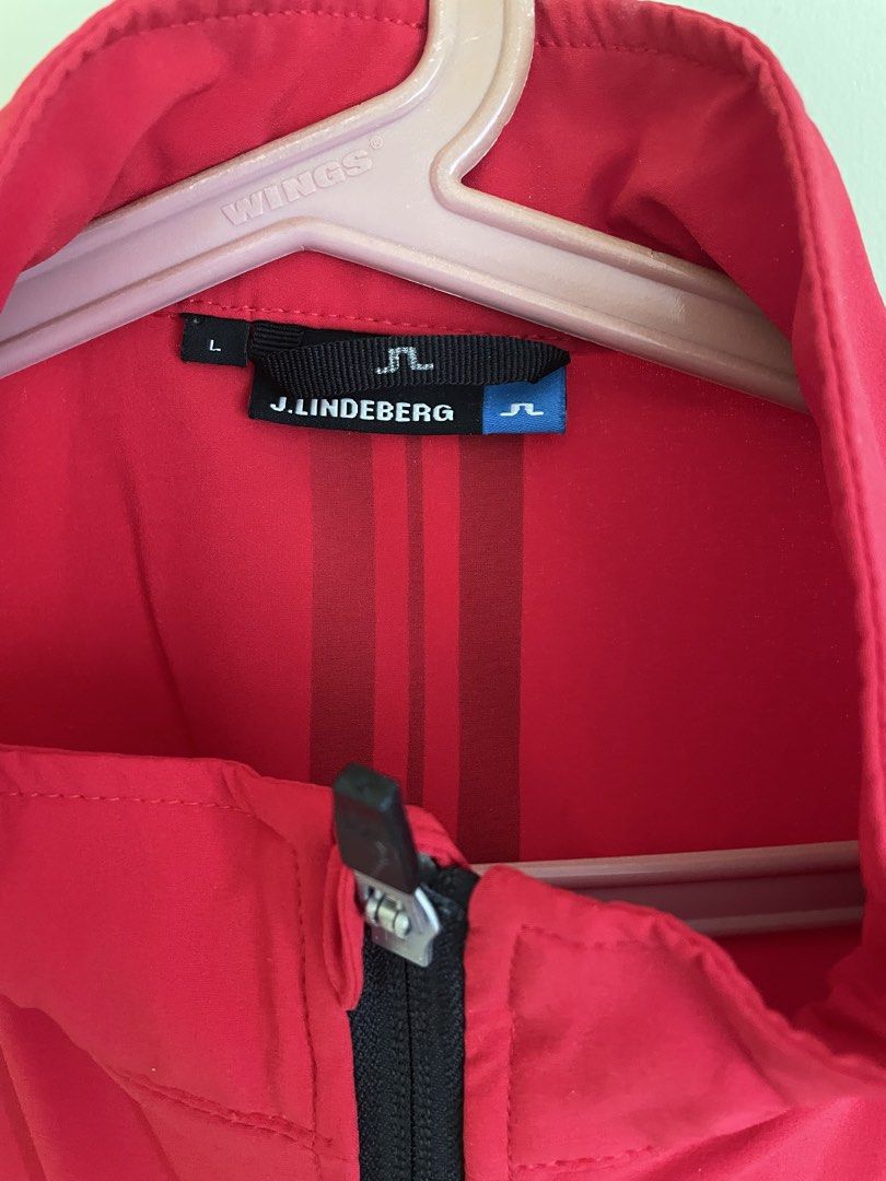 j.lindeberg Red Jacket (Category: Coats, Jackets and Outerwear) located in Muntinlupa City. Submitted by bestoption4u (Listing ID 1459531626, Image 3). Description: Color Red w/ Grey & Black Panel Accent J.Lindeberg Logo Stripes on Back Side Zippers for Adjustable Fit Size: Large (L) ** No issues, good as new.