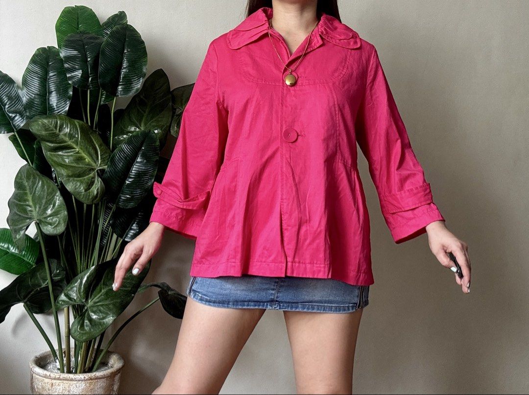JUNKO Pink Collared Cropped Jacket with Button Detail,m to l (Category: Coats, Jackets and Outerwear) located in Mandaluyong City. Submitted by roxieeeeeee (Listing ID 1459656348, Image 2). Description: - Eye-catching bright pink cropped jacket - Classic collared neckline - Single button front closure - Stylish 3/4 length sleeves with rolled cuff detail - Subtle pleats at the hem create a slight flare - Unique back detail with a small flap and bu
