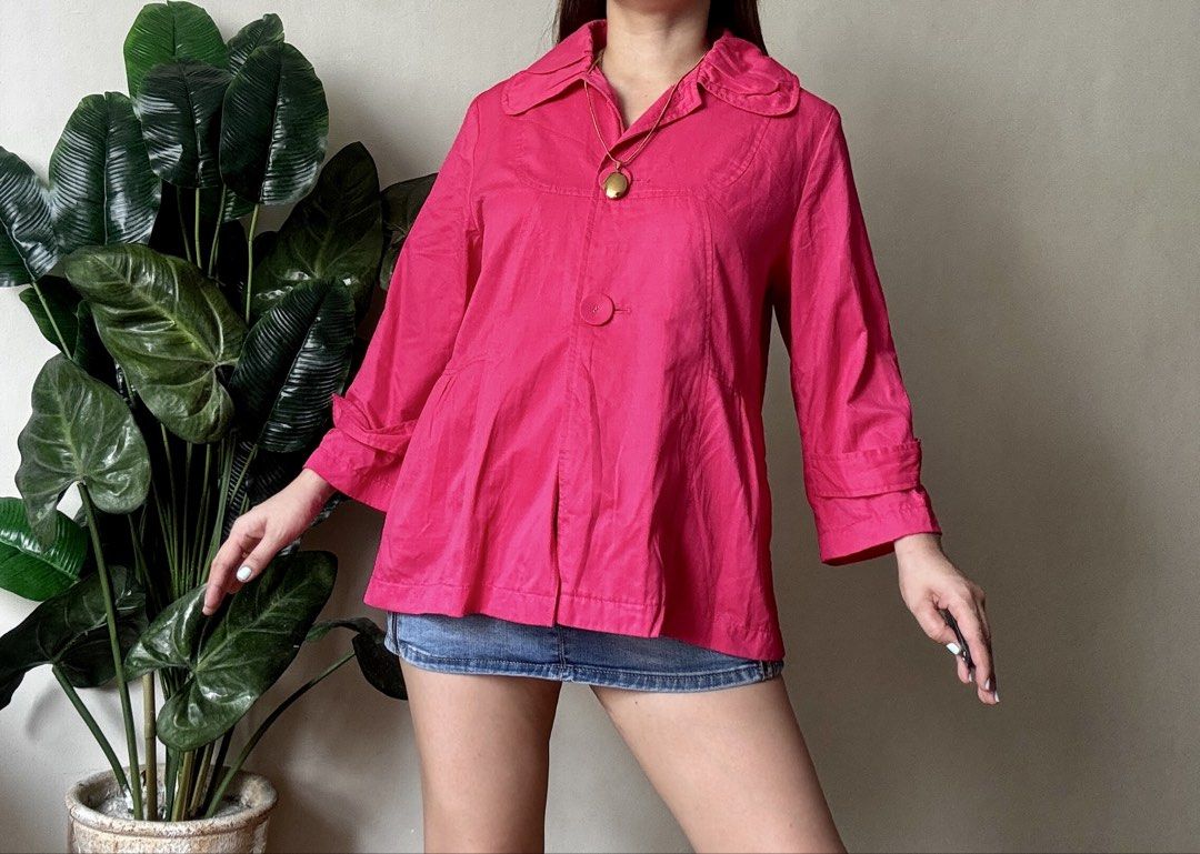 JUNKO Pink Collared Cropped Jacket with Button Detail,m to l (Category: Coats, Jackets and Outerwear) located in Mandaluyong City. Submitted by roxieeeeeee (Listing ID 1459656348, Image 1). Description: - Eye-catching bright pink cropped jacket - Classic collared neckline - Single button front closure - Stylish 3/4 length sleeves with rolled cuff detail - Subtle pleats at the hem create a slight flare - Unique back detail with a small flap and bu