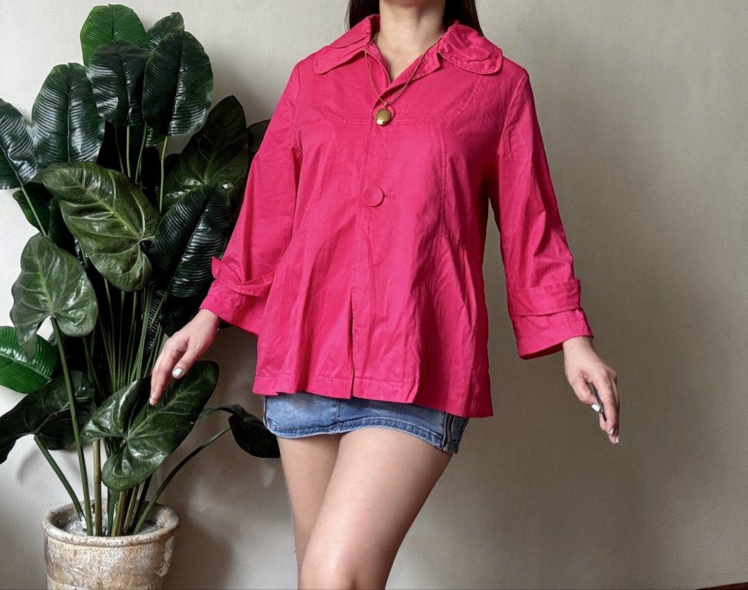 JUNKO Pink Collared Cropped Jacket with Button Detail,m to l (Category: Coats, Jackets and Outerwear) located in Mandaluyong City. Submitted by roxieeeeeee (Listing ID 1459656348, Image 3). Description: - Eye-catching bright pink cropped jacket - Classic collared neckline - Single button front closure - Stylish 3/4 length sleeves with rolled cuff detail - Subtle pleats at the hem create a slight flare - Unique back detail with a small flap and bu