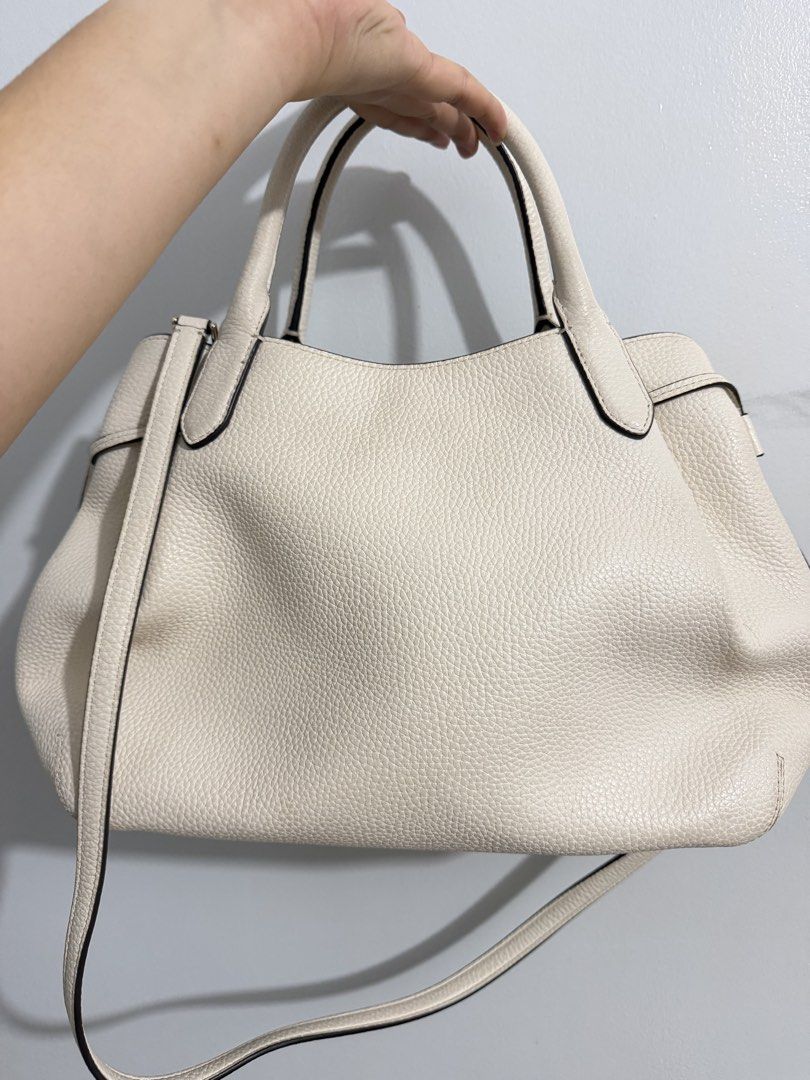 Kate Spade Large Dumpling White (Category: Luxury Bags & Wallets) located in Manila. Submitted by kimcheen (Listing ID 1459639000, Image 2). Description: This is preloved. Original from the US. Condition: 8/10 Large Dumpling!! Super daming mailalagay sa loob as in very spacious. What you see is what you get po. Bawal sa maarte. Measurements · Length: 12.8” · Height: 9.6” · Width: 6.4”. Materials. Pebbled leather; 2 Way Script Logo; Lining: fabric