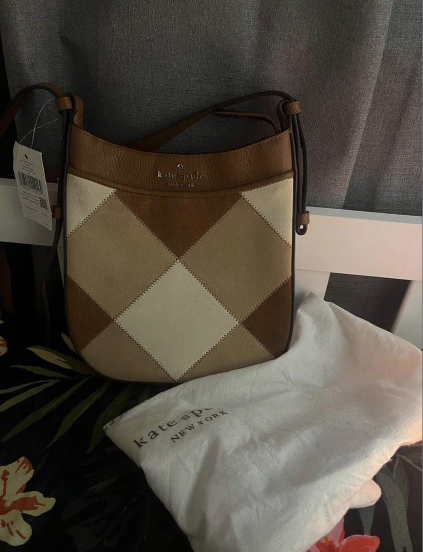 Kate Spade Patchwork Suede Leather Crossbody Bag (Category: Cross-body Bags) located in Andop. Submitted by nikiprelove55563 (Listing ID 1459516268, Image 2). Description: - Authentic Kate Spade crossbody bag - Stylish patchwork design with suede and leather - Neutral color palette: brown and cream - Comes with original dust bag - Adjustable strap for customized comfort - Ideal for everyday use.