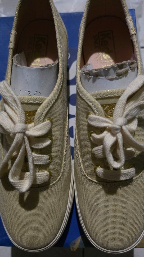 Keds Gold Glitter Platform Sneakers (Category: Sneakers) located in Rizal. Submitted by kaj18 (Listing ID 1459579423, Image 1). Description: Condition: 8/10 -still on good condition, dirt on rubber part is removable - Color: Gold with shimmer -Size: US 5.5 UK 3 EU 35.5 CM 22.5.