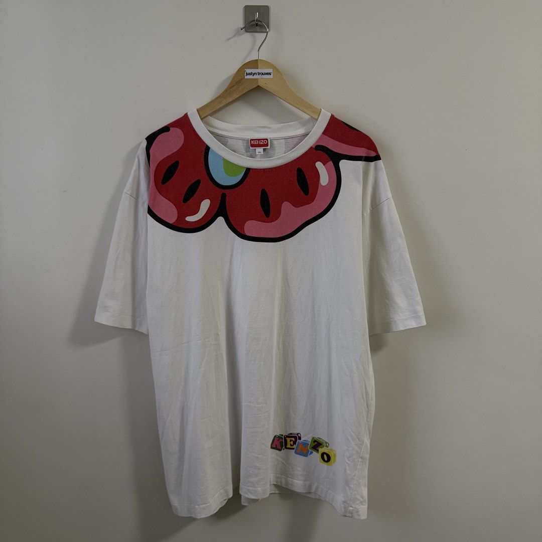 Kenzo Nigo Boke Boys Tee (Category: Tshirts & Polo Shirts ) located in Paniqui. Submitted by justyntrouves (Listing ID 1459516503, Image 1). Description: (Legit/ Authentic✅) Tag Size: XL (Dimensions in inches) Width: 25 Length: 31 Condition: 9/10 Buyer will shoulder the shipping fee. Check all photos before purchasing. For any questions, feel free to ask. .