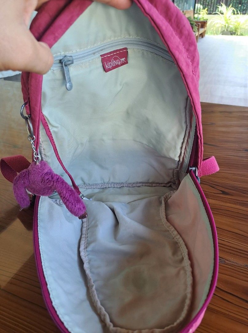 Kipling Pink Nylon Mini Backpack with Monkey Charm (Category: Backpacks) located in Tagum. Submitted by marny0503-00673 (Listing ID 1459512542, Image 3). Description: Ang pretty ni monkey 🐒🥰 Authentic/Original Kipling Backpack, Preloved Ukay ‼️‼️👜👜 Made in China With code Ganda excellent condition 😍 Please zoom in and zoom out to appreciate and to know the actual condition of the item. 👉Disclaimer : Thrifty Branded Bags Ukay Ukay Shop is no