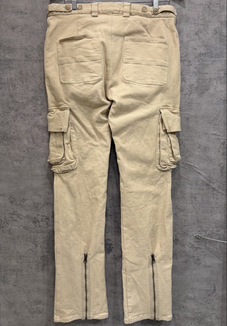 K-TWO STUDIOS - CARPENTER FLARED CARGO PANTS (Category: Trousers) located in Makati City. Submitted by daboy_ (Listing ID 1459670899, Image 3). Description: K-TWO STUDIOS - CARPENTER FLARED CARGO PANTS Size: 32-33 waist Condition: 10/10 Material: 100% Cotton Zipper: YKK Dimensions Length: 42” Inseam: 32” Thigh: 11” Knee: 8” Leg opening: 9” Front rise: 12”.