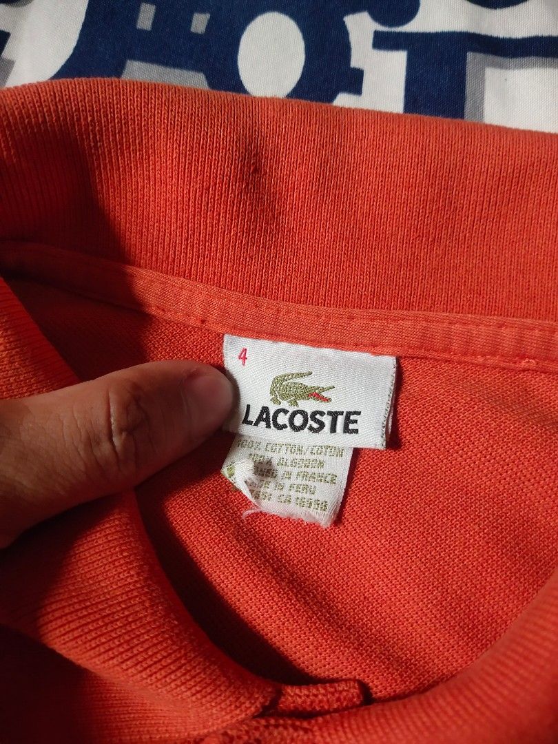 LACOSTE (Category: Luxury Accessories) located in Balayan. Submitted by _dressthirftbetter. (Listing ID 1459594179, Image 3). Description: LACOSTE - Size 4 - Length: 27 - Width: 21.5 - Color Rate: 10/10 - Issue: Small Pin hole - Condition: 10/10 DM for Price📩 Balayan, Batangas.